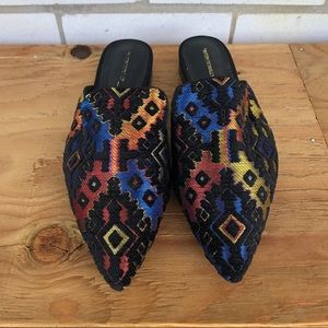 Intentionally blank embroidered mules